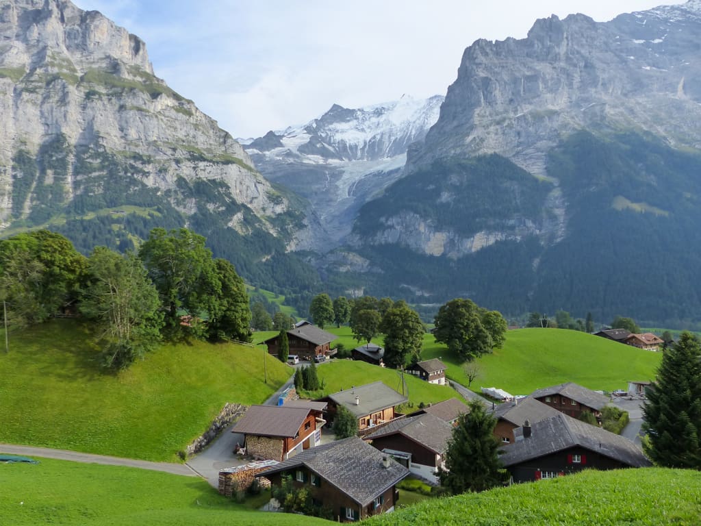 An alpine vista in Grindelwald, with the folded layers of Swiss Alps